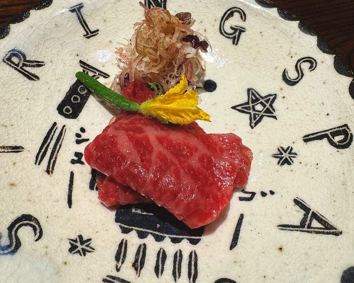 Beef sashimi with cucumber.